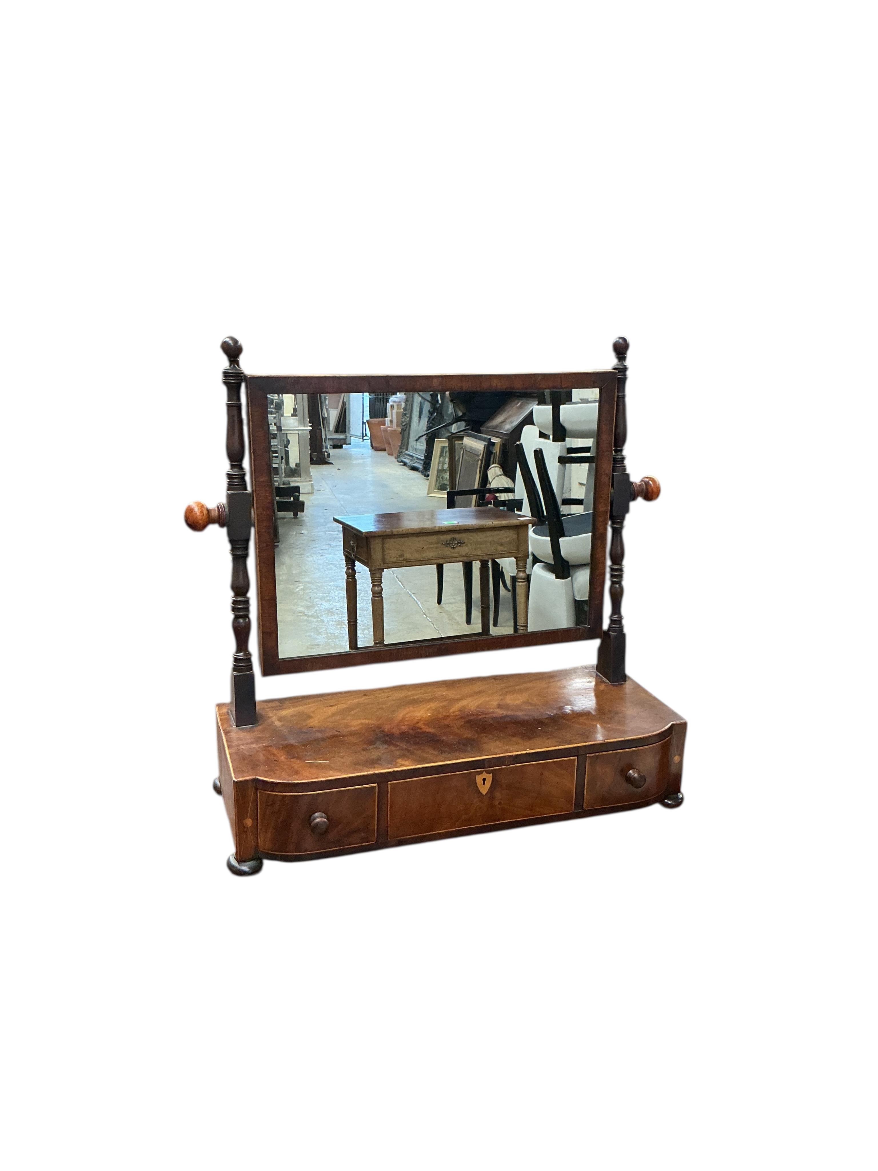 A Regency mahogany bowfront box base toilet mirror, width 52cm, depth 21cm, height 54cm